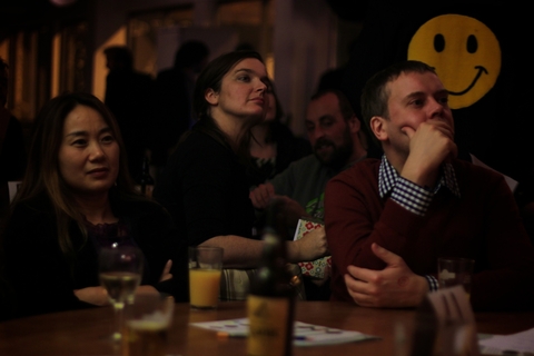 Audience members watching intently